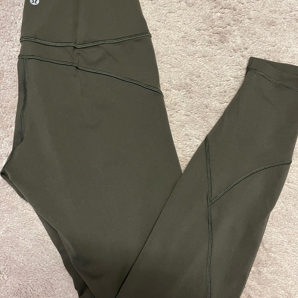 Size 8 dark green lululemon in movement leggings